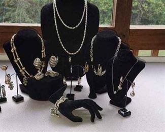 4 Necklaces, 10 Pair Of Earrings 1 Bracelet