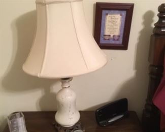 Lamp in bedroom, phone & clock