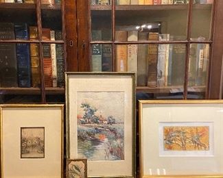 Several framed artwork selections.