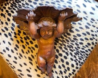 Carved wood cherub