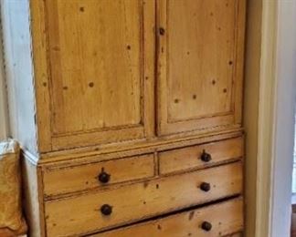 Large pine cupboard. Provides lots of storage.