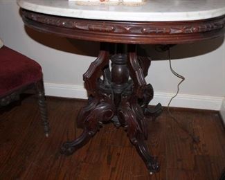 OVAL MARBLE TOP TABLE