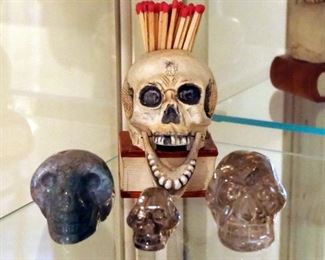 Glass, Stone, And Porcelain Skull Figures