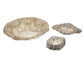 1023
An Alvin Sterling Silver Berry And Nut Set
First-quarter 20th Century
Each marked for Alvin and sterling: Further numbered: 2666 / 1158 / 1108
Each with repousse Art Nouveau poppy motif, comprising a large round bowl (2.25" H x 11.125" Dia.), a medium oval dish (1.5" H x 7.25" W x 6" D), and twelve small oval dishes (.75" H x 4.125" W x 3.5" D), 14 pieces
24.925 oz. troy approximately
Estimate: $600 - $800