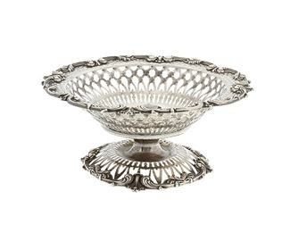 1024
A Frank Herschede Co. Sterling Silver Compote
First-quarter 20th Century
Marked: Frank Herschede Co. / Sterling / 5288 X / 7 1/2 IN
The American sterling silver footed compote with all-over reticulated design
3.25" H x 7.75" Dia.
8.59 oz. troy approximately
Estimate: $300 - $500