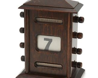 1042
A Wood Perpetual Desk Calendar
First-half 20th Century
Displaying the day of the week, date, and month
6.5" H x 5" W x 3.25" D
Estimate: $200 - $300