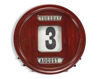 1041
An Edwardian Perpetual Wall Calendar
Circa 1910
The round, carved wood perpetual wall calendar displaying day, date, and month
3.25" H x 17.75" Dia.
Estimate: $300 - $500