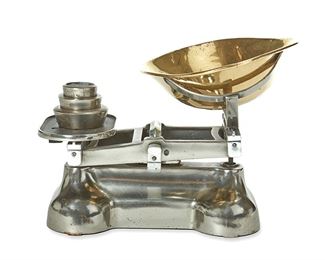 1043
A Metal Grocery Scale
Circa 1900
The scale with a brass scoop and three weights, 5 pieces
14" H x 16" W x 8" D
Estimate: $400 - $600