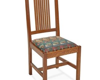 1046
A Contemporary Stickley Oak Chair
1995; Manlius, NY
With Stickley burned mark; further dated and numbered: MAR 13 1995 / # 35
The spindle back chair with polychrome fabric upholstered seat raised on four square legs joined by an H-stretcher
40.5" H x 17.5" W x 22" D
Estimate: $200 - $400
