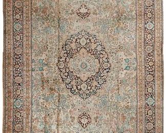 1063
A Persian-Style Area Rug
Fourth-quarter 20th Century
Silk on silk foundation, with polychrome floral motifs centering a medallion in tones of pink and teal
170" L x 123" W
Estimate: $1,500 - $2,500