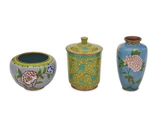 1074
Three Chinese Cloisonné Table Items
Republic Period (1912-1949)
Jar marked: China
Each polychrome enamel cloisonne with brass rims, comprising an urn-form vase with pink flowers on a blue ground, a yellow and green lidded cylindrical jar, and a bowl with a polychrome floral spray on a light-blue ground, 3 pieces
Larger: 7" H x 4.25" Dia.; Smaller: 4.125" H x 6.25" Dia.
Estimate: $200 - $400