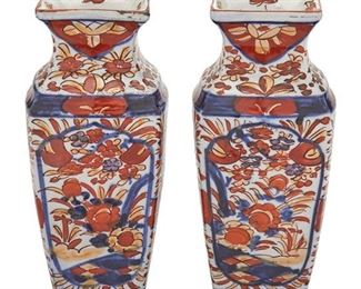 1076
A Pair Of Chinese Imari Porcelain Vases
Late Qing Period (1636–1912)
Each Imari ware vase with tapered square-form body and pinched neck decorated with blue underglaze and red and orange enamel overglaze floral motifs, with a cartouche framework to one side, 2 pieces
Each: 8.75" H x 3.75" W x 3.75" D approximately
Estimate: $200 - $400