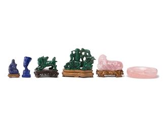 1078
A Group Of Chinese Carved Hardstone Objects
20th Century
Comprising a carved malachite shishi lion on base, carved malachite figure on base, a carved rose quartz recumbent horse, a rose quartz bowl, and two lapis lazuli figures, 6 pieces
Larger: 3.5" H x 5.25" W x 1.5" D
Estimate: $200 - $400