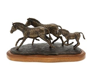 1081
Wah Ming Chang
1917-2003, Chinese/American
"Running Zebras"
Patinated bronze on wood base
Edition 10/90; signed: Wah Chang; signed again, titled, and numbered in black ink to underside
4.5" H x 11" W x 4.75" D
Estimate: $300 - $500