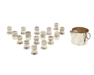 1091
A Group Of Sterling Silver Table Items
Mid-20th century
Each marked for sterling, with various maker's marks
Comprising a Mexican silver baby sipping cup (2.25" H) and sixteen variously designed diminutive salt and pepper shakers (each: 1.5"H), 17 pieces
8.18 oz. troy approximately
Estimate: $200 - $300