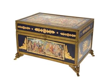 1098
A Sèvres-Style Porcelain Jewelry Casket
First-quarter 20th Century
With blue underglaze double "L" mark containing "S" over "France"
The satin-lined box with gilt enamel highlights on a glazed cobalt blue ground centering Classical figural scenes
8" H x 14" W x 9.75" D
Estimate: $600 - $800