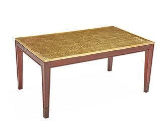 1115
A Philippe Starck Coffee Table
20th Century
The rectangular coffee table with a textured gilt top under glass and raised on four carved wood legs
18.5" H x 39.75" W x 24" D
Estimate: $500 - $700