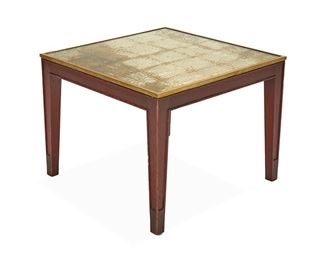 1116
A Philippe Starck Side Table
20th Century
The square side table with a textured gilt top under glass and raised on four carved wood legs
18.5" H x 24" W x 24" D
Estimate: $500 - $700