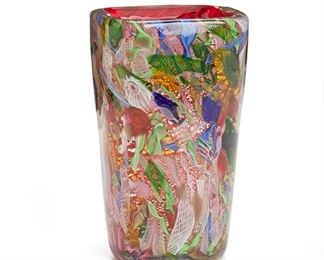 1123
A Murano Murrina Art Glass Vase
Third-quarter 20th Century
Likely by the Murano Company A.V.E.M., the square-form vase with multi-colored murrina, metallic foil inclusions, and red cased interior
8" H x 4.625" W x 4.5" D
Estimate: $300 - $500
