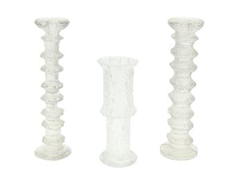 1130
Three "Festivo" Glass Table Items By Timo Sarpaneva For Iittala Of Finland
Circa 1960s-70s
Each with etched mark: TS
Each molded glass with ice-motif texture, comprising two candlesticks (each: 12.375" H x 3.375" Dia.) and one vase (9.125" H x 3.5" Dia.), 3 pieces
Estimate: $200 - $300