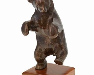 1140
Wah Ming Chang
1917-2003, Chinese/American
"Dancing Bear"
Patinated bronze on wood base
Edition 61/90; signed: Wah Chang; signed again, numbered, and titled in black ink to underside
9.75" H x 5.25" W x 5" D
Estimate: $500 - $700