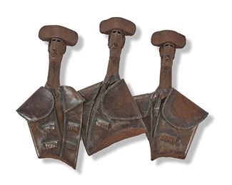1145
A Brutalist-Style Iron Figural Wall Sculpture
Second-half 20th Century
Appears unsigned
Depicting three abstract figures wearing Spanish matador "traje de luces" outfits
34" H x 41" W x 4" D
Estimate: $600 - $900
