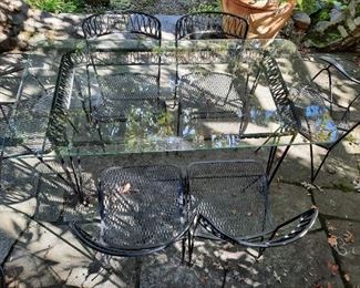 Salterini wrought iron dining set circa 1952, refinished. Designer M. Tempestini. Plate glass table with 2 arm & 4 side chairs.   High quality outdoor furniture - -  other pieces available, too