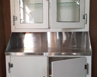 ART DECO Medical office cabinet in excellent condition with Stainless work area, chrome knobs and hinges, and rubber wheels.  Made in OZONE PARK, NY  circa 1935. . . . .the only one in captivity!       CHEAP CHIC