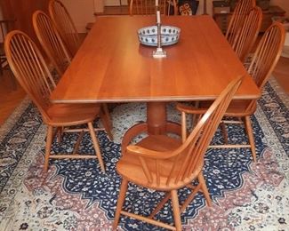 SOLID CHERRY WOOD double pedestal table 50 x 90 inches, with 2 arm and 6 side chairs. In excellent condition.     Custom Hand-made for the sellers by CLEAR LAKE FURNITURE IN  Ludlow, VT.  Amazing craftsmanship and details.   PRICED AT A FRACTION OF COST!