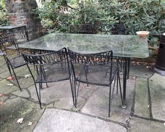Salterini dining set,  hand-wrought iron and professionally re-coated in jet black.  Designed by TEMPESTINI, circa 1952 in the desirable  "Ribbon" pattern . . . . . .   Midcentury Italian-American Chic,  highest quality,  priced to GO.