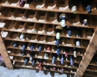 WINE CELLAR  -  BUY THE BOTTLES AND THE RACKS..........CHEAP