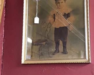 Love this little boy.  The light makes it look like the glass is broken...it's not.