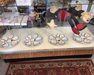 Oster Plates from early 1900's  Blue Fishnet background.