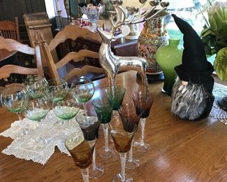 WE have beautiful stemware.  Our Dracula Gnome is giving them another look.