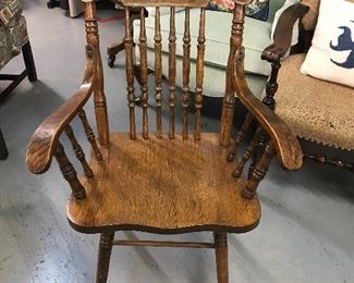 Love this pressed back oak arm chair