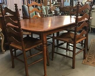 Love this table with pad feet.  The ladder back chairs are just a perfect fit.