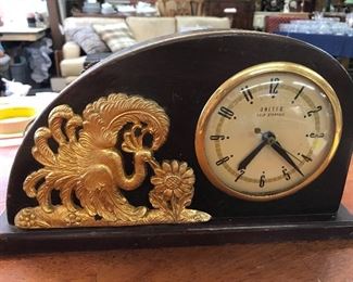 Peacock Mantel clock.  Needs a little work and then it will be even more amazing.