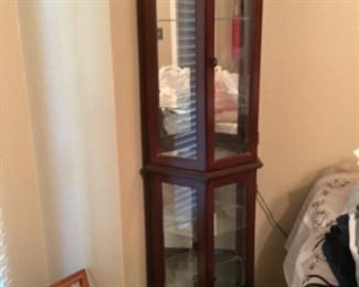 Small curio cabinet. If you were interested in the curio cabinet. Please let us know. We will take you in the house. 