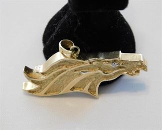 Solid 14K Denver Broncos pendant, with diamond eye. Very Heavy. There were two made, here is one, John Elway has the other.