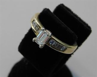14K and Diamond Emerald cut ring. This one was custom made for our client. 