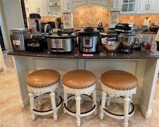 Three Frontgate 24 inch island barstools with leather seats rivets and antiqued sculpted body