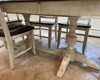 Canadian made walnut and antiqued French farmhouse table with double pedestal and six antiqued mission style chairs. Excellent used condition