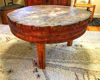 Antique Butcher Block Three Leg Table, currently used as a coffee table 