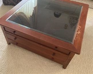 Glass topped display table $200