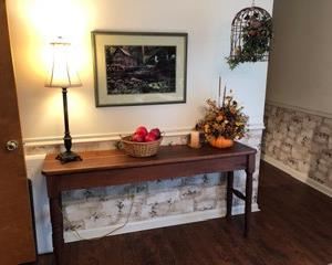 Another view of this beautiful Harvest table, and another lovely lamp to enhance your home.  Also there is so much art available at this exceptional Estate Sale.