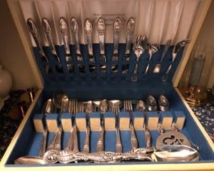 First Love Sterling Silver plated complete service for 8.  This set has been lovingly kept in this Sterling Chest it came in!  It is beautiful and in excellent condition!