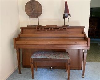 Piano and bench - good condition, but has been over 5 years since last tuning

Wooden decorative piece

Resin thing, maroon marbled & will make folks think you are a warlock for Halloween