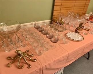 Punch bowl sets, smoked glass saucer champagne set, milk glass, twisted stem cordials and heavy crystal vases!