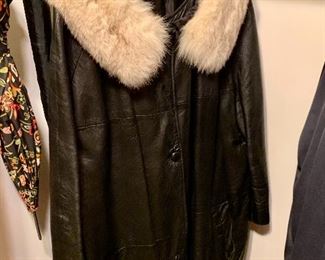 Leather with fur top.   Retro fancy - will turn heads and get people wanting to hug you just to touch the fur.    We warned you.    (XL-XXL ish size)