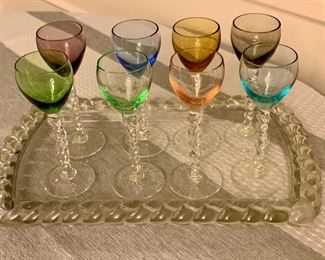 Twisted stem retro cordial glasses, that I found look like they were made to go with this bread tray.    It’s true, it a bread tray - I saw my mom use it as such - but for forever on it should probably be a part of this glass set.

#estatesaletruths